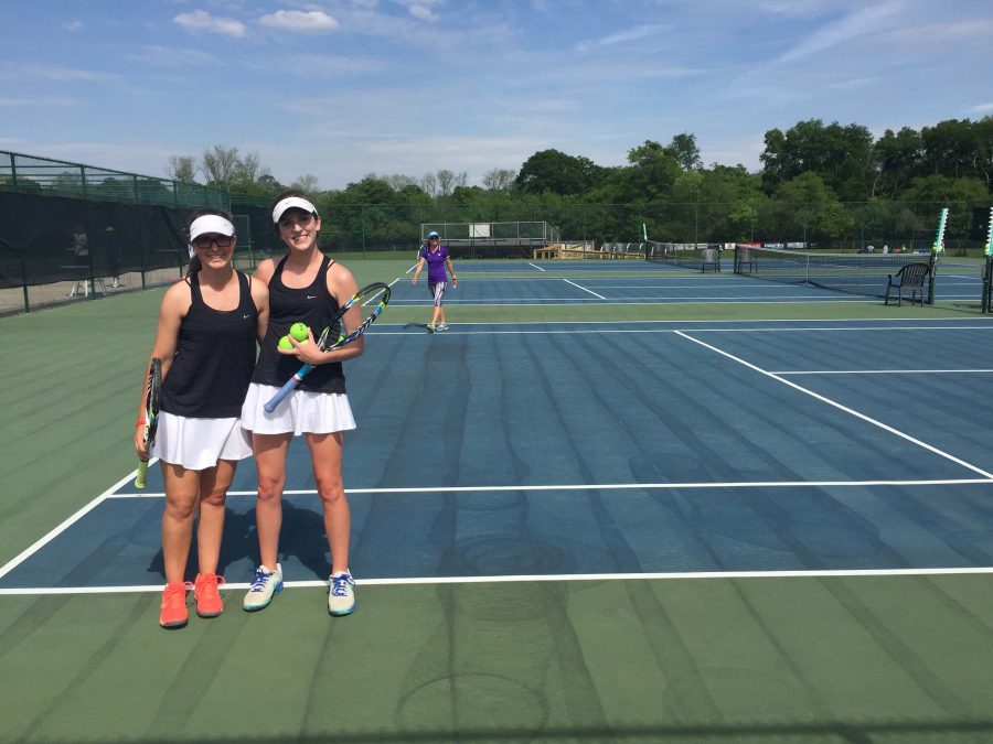 Lisa Van Susteren (left) and Caroline Thoms (right) pose for a picture before beginning their warm up during their state match against Holy Innocents on April 20. 