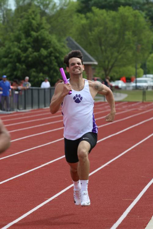 Senior, Jonny Treco finishes up the 4 by 4 relay at Darlington High School on April 19, 2016.