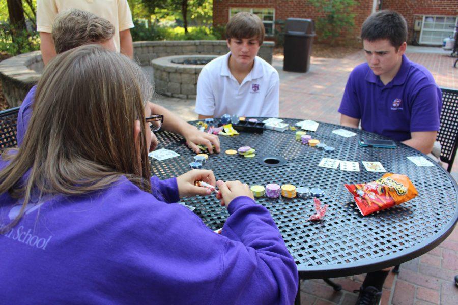 In order to win, you have to keep your eyes on the prize (or candy). Sophomore Ted Garner studied the moves of his opponents at Casino Day. 