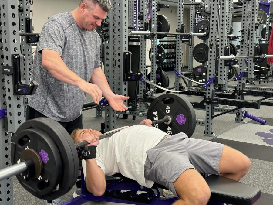 Spotted by Head of Neville House Joe Pitts, senior Noah Morris bench presses 305 pounds in the weight room.