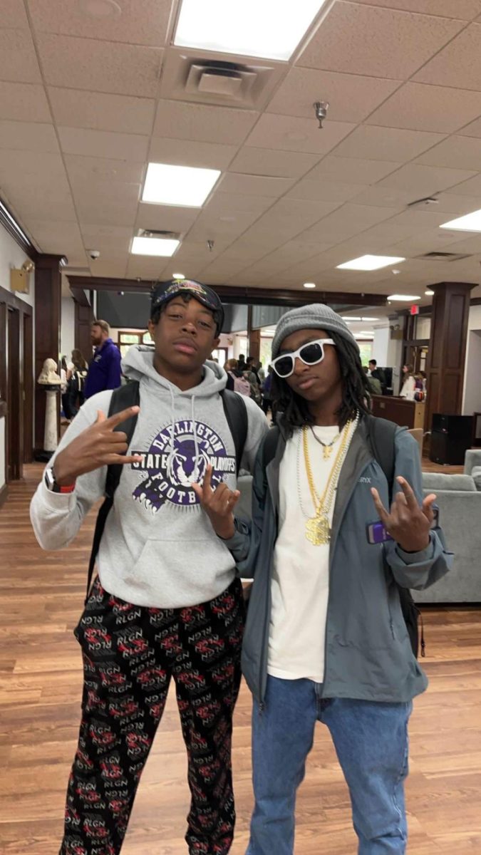 Freshmen Tylin Lovingood and Kylan Ferrell pose for Rhyme Without Reason Day on Oct. 16. They were 'napper' and 'rapper'. 