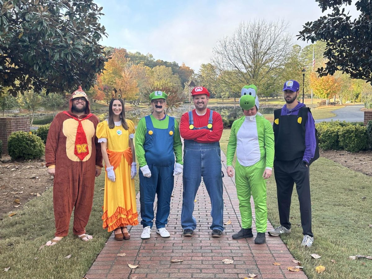 The Upper School's math department poses with their costumes