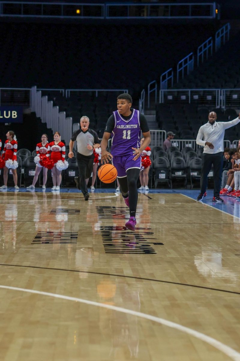 Teasley dribbling the ball at State Farm Arena on Nov 25.