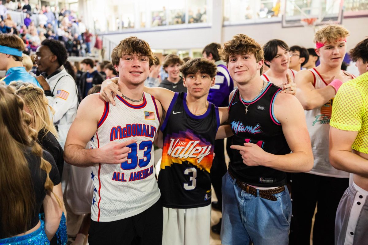 Seniors Sam Twente, Charlie Patel and Noah Duggan pose for a picture after RUMPUS Lip Sync last year.