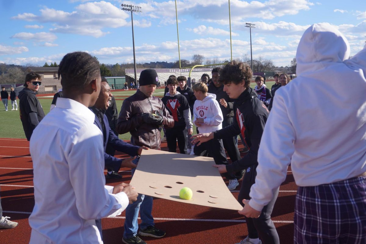 One of Neville's teams competes in a relay event.