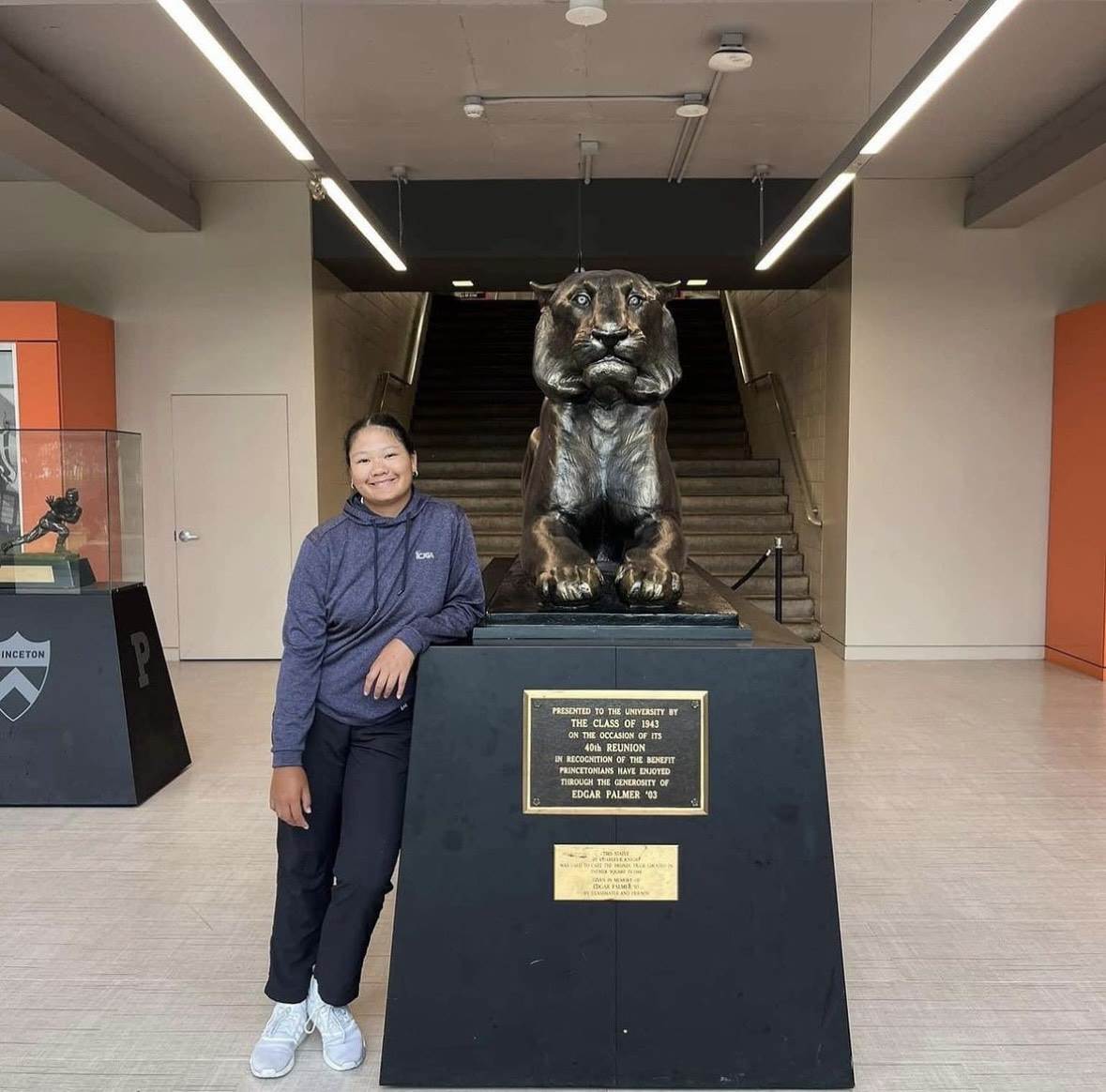 Ther Kotchasanmanee ('25) poses by the Princeton tiger.