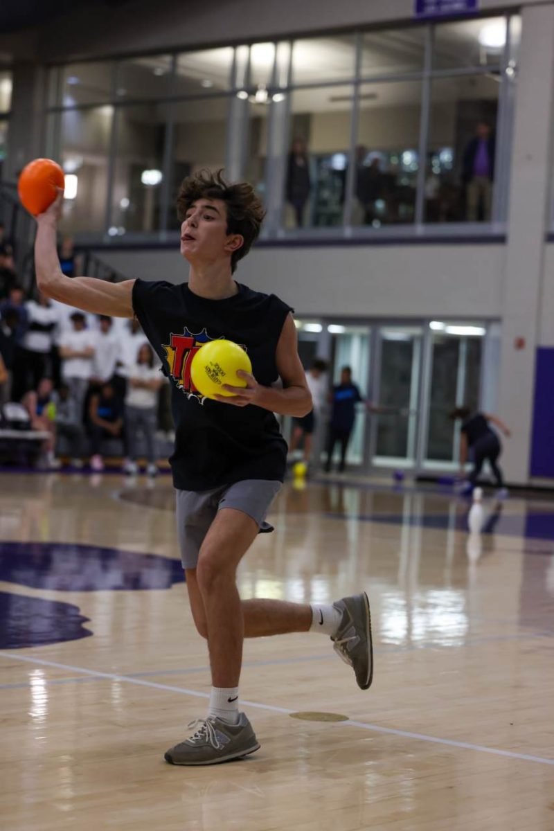 Freshman Wilson Lucas throws a dodgeball at the opposing team during RUMPUS Dodgeball on Jan. 24.