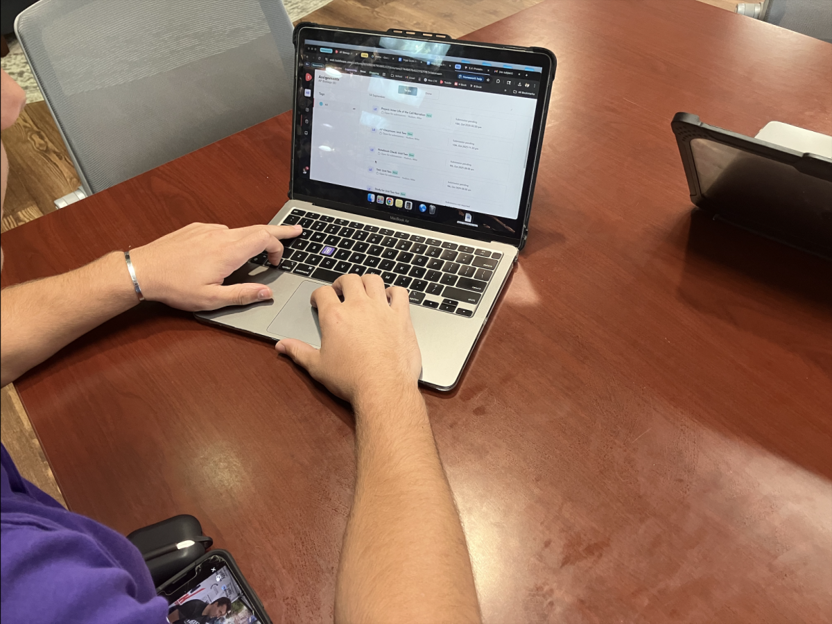 A student uses Toddle to find their homework assignments.