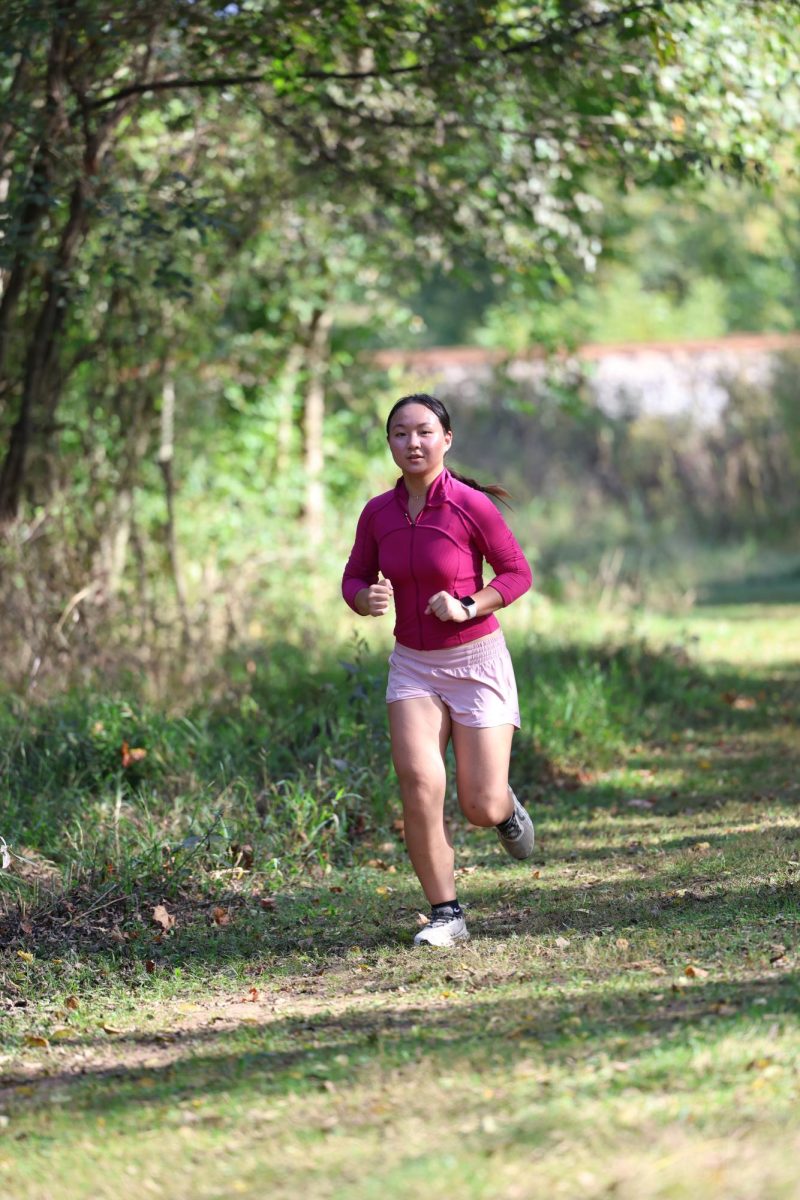 Sophomore Tiffany Hong runs the trail.