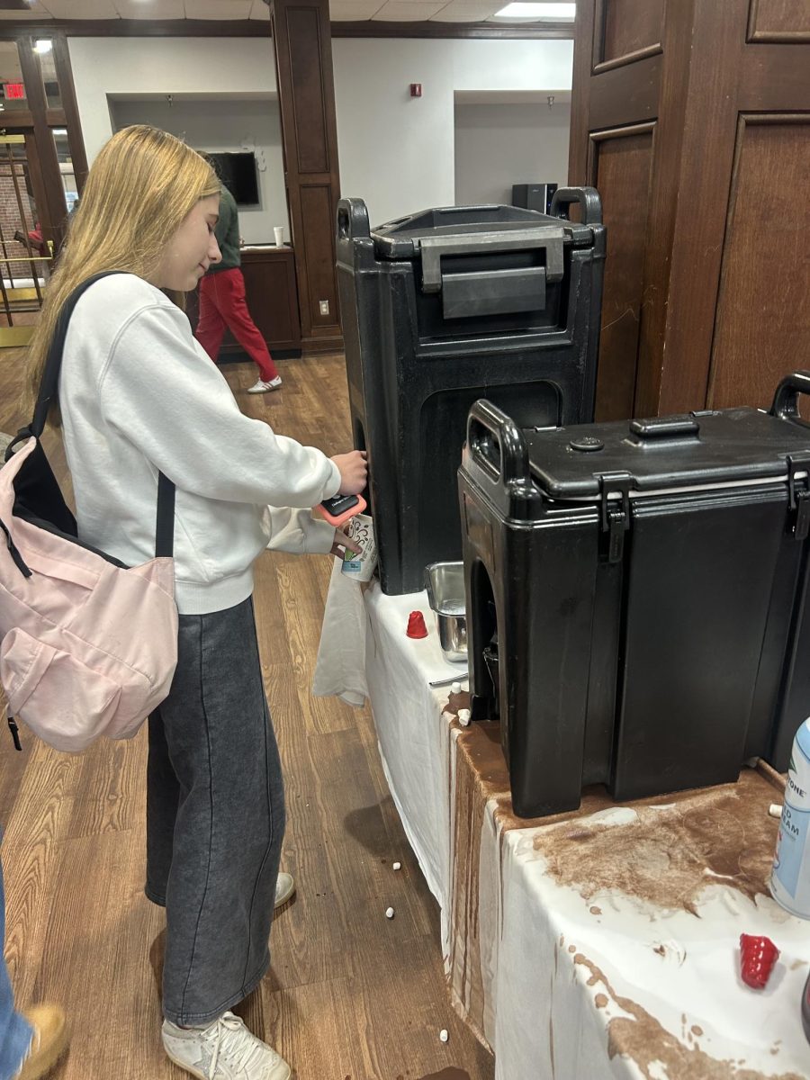Freshman Daniela Lopez-Espejo Panos gets hot chocolate from student center.
