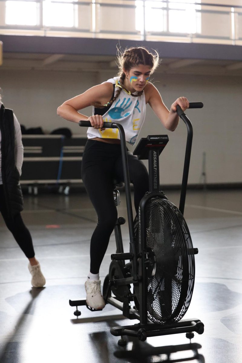 Sophomore Audrina McNab bikes on the bike of death.