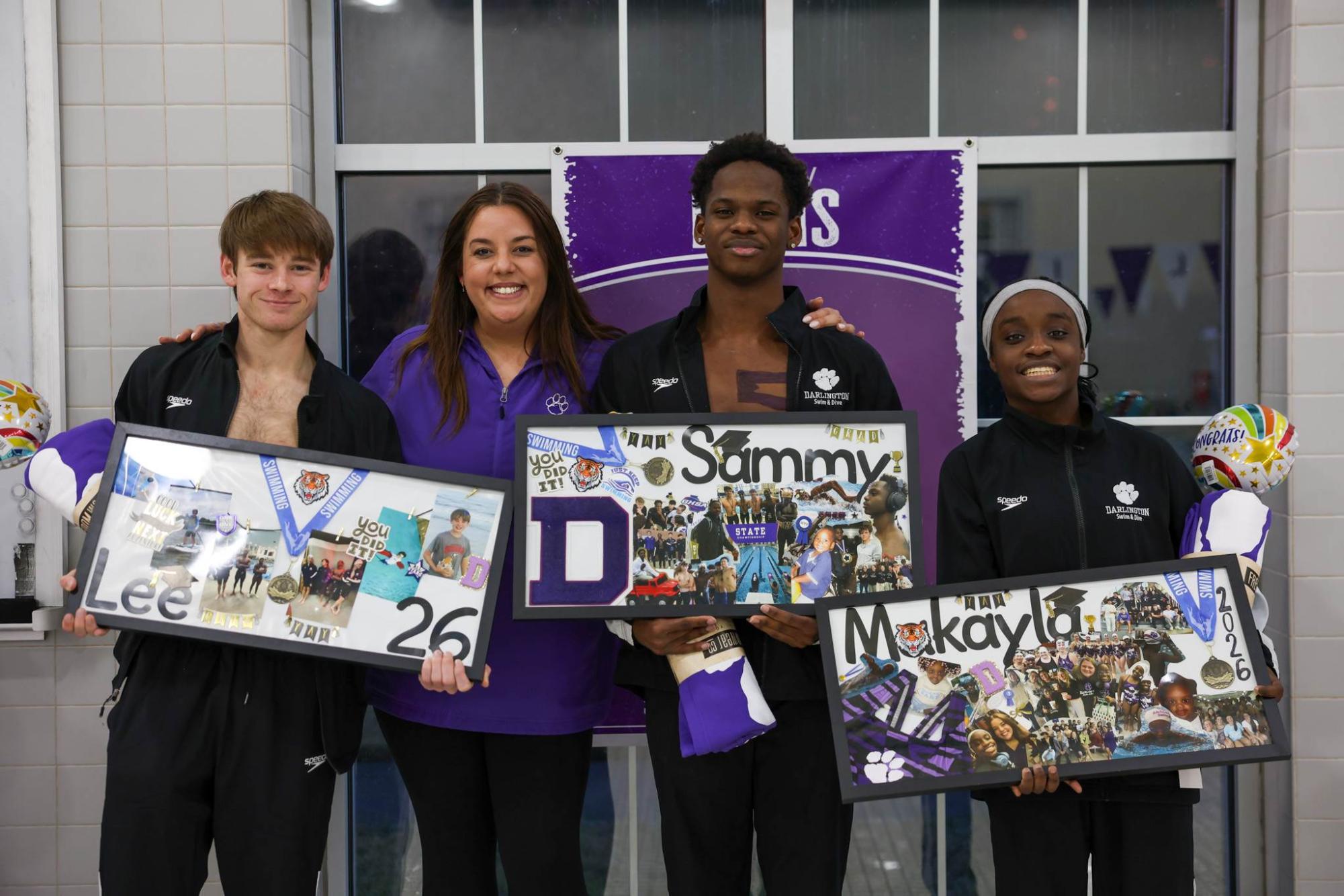 Seniors Lee Donahue, Sammy Lewis and Makayla Edorhe pose with their coach