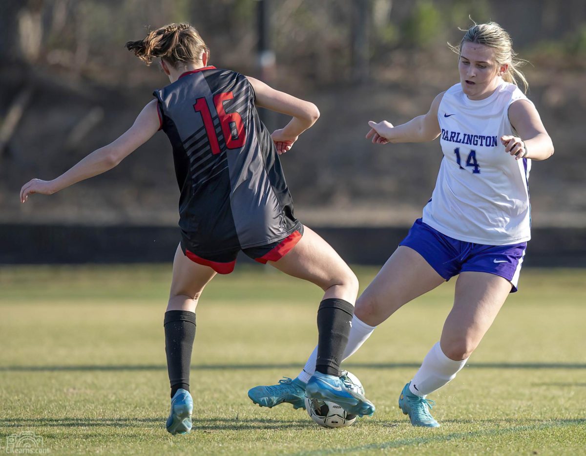Freshman Georgia Kate Barksdale is fighting for the soccer ball. 
