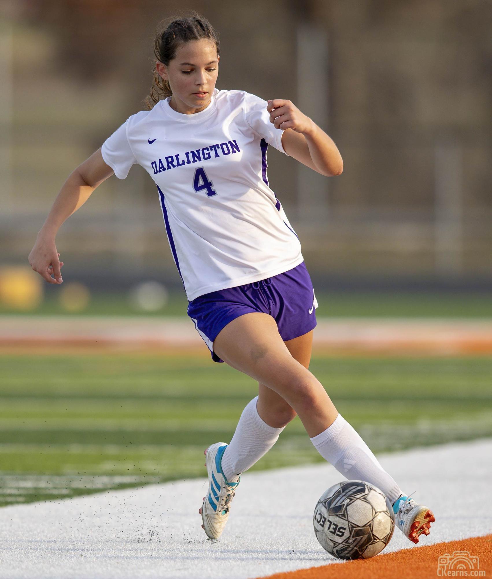 Gracie Cowan dribbles the ball