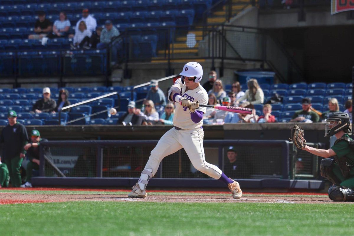 Henry Ledbetter swings at the ball.
