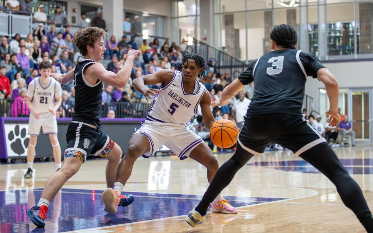 DJ Hall fights to create a shot during a playoff game against St. Francis