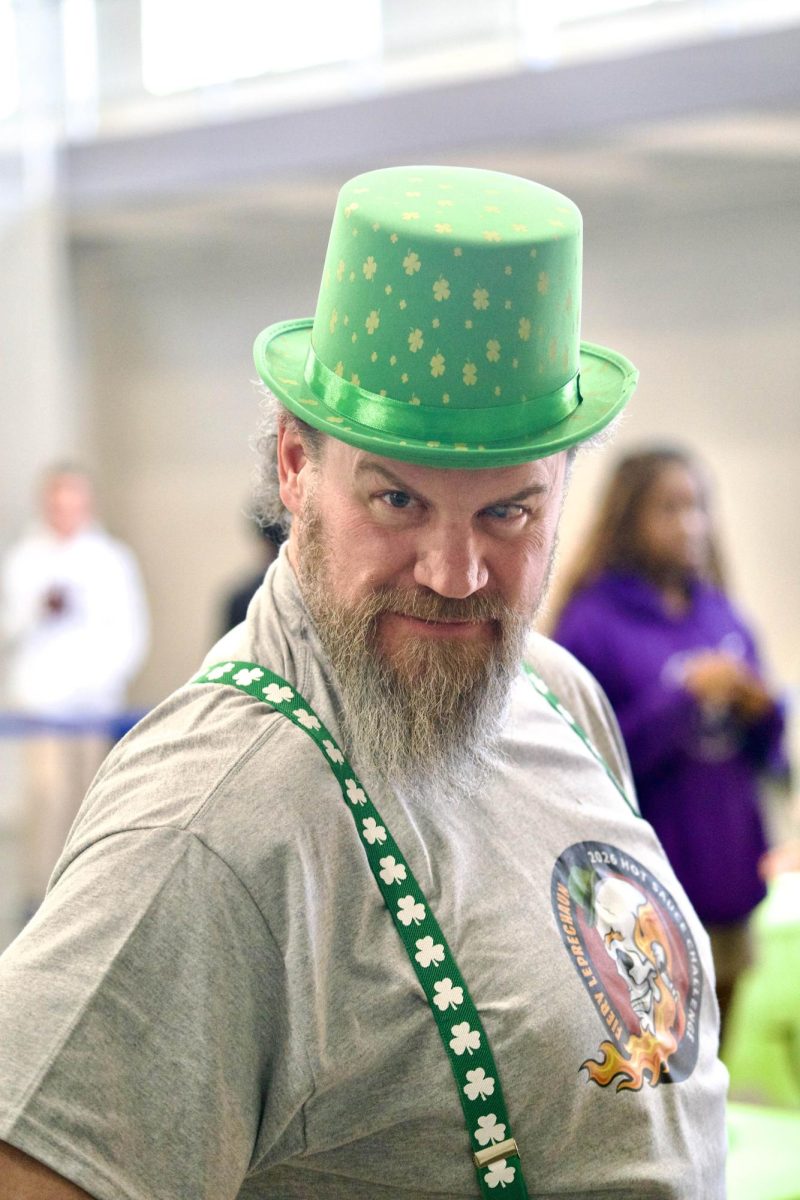 Coach Pitts helps run the Fiery Leprechaun Challenge
