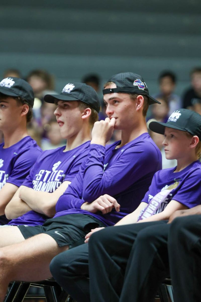 Senior Brent Bell watches a replay of the game's final moments.