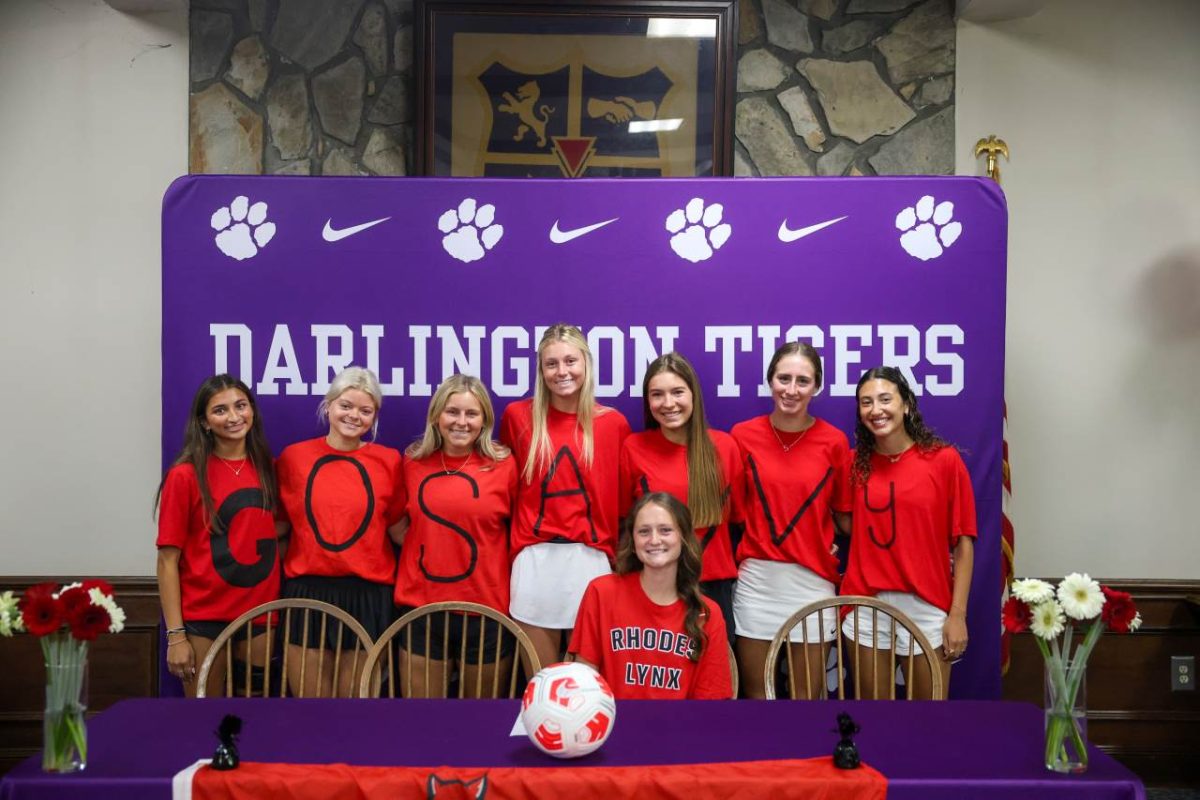 Savannah Palmer poses with her friends at her soccer signing on Friday, April 17th.